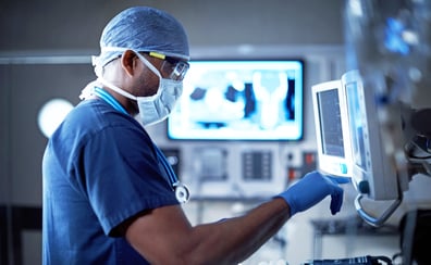 GettyImages-592647720-Doctor_Looking_at_Screens-RET (1)