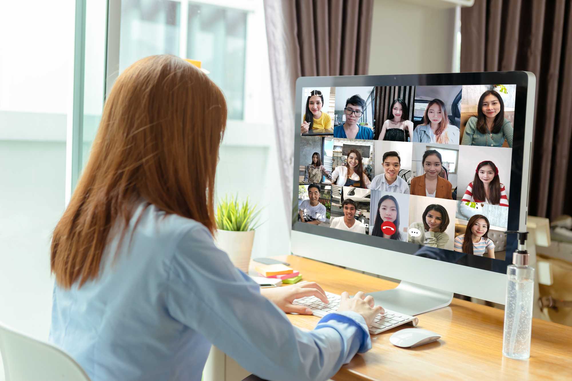 woman on zoom call faceless, close, light blue
